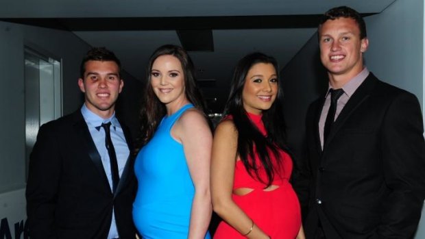 Mitch Cornish and partner Abbey Cambridge, and Monisha Lew-Fatt and Jack Wighton at the Canberra Raiders Meninga Medal presentation night at the AIS Arena on Wednesday. 