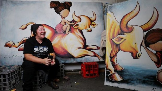 Street artist Kaff-eine with some of the work for her upcoming exhibition.
