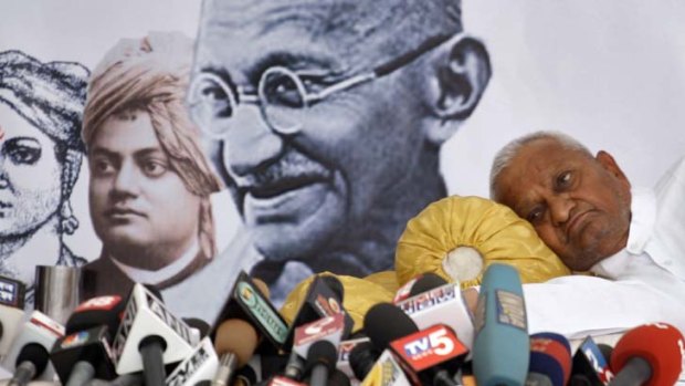 Anna Hazare,  a social activist of decades' standing, faces the media during a hunger strike to protest against India's pervasive corruption.