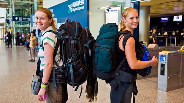 Big adventure ... backpackers heading off on their travels.