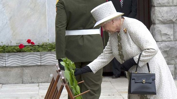 Landmark gesture ... the Queen lays a wreath in the Garden of Remembrance in Dublin.