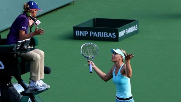 Maria Sharapova argues with the umpire during her match with Camila Giorgi.