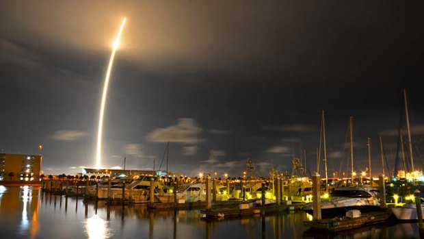 Blast off ... SpaceX's Falcon 9 rocket.