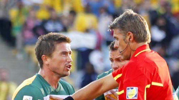Australia's Harry Kewell reacts after being shown the red card by referee Roberto Rosetti of Italy during the Group D match against Ghana at Royal Bafokeng stadium in Rustenburg.