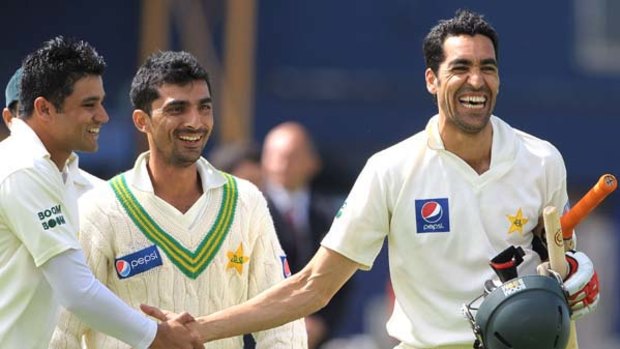 Pakistan's Umar Gul (right)  is all smiles after hitting the winning run.