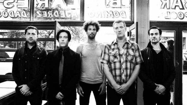Homme with Queens of the Stone Age's current line-up.