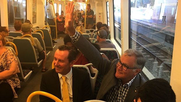 Dr Geoff Gallop on the train from Rockingham with Labor leader Mark McGowan.
