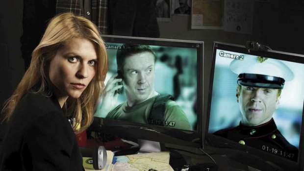 Homecoming &#8230; Claire Danes and Damian Lewis (on screens).
