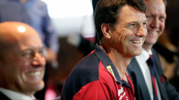 One of the Demons: Paul Roos with Peter Jackson and club president Glen Bartlett after the announcement on Friday.
