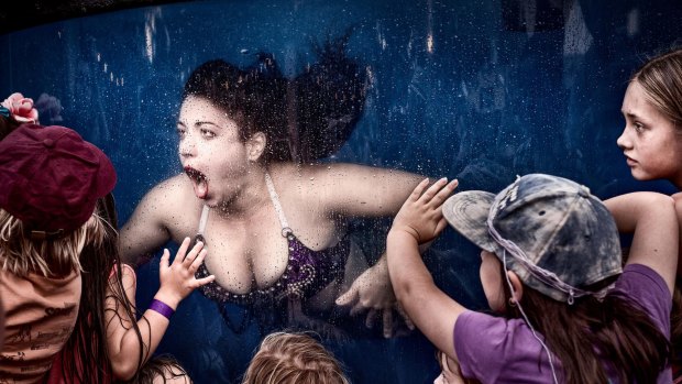 "Mermaid Show", the 2016 Moran Contemporary Photographic Prize winner, has "a painterly quality, almost like a religious painting", says judge Alan Davies.