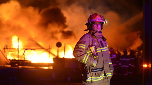 A firefighter from the Frankston CFA at the heart of the fire.