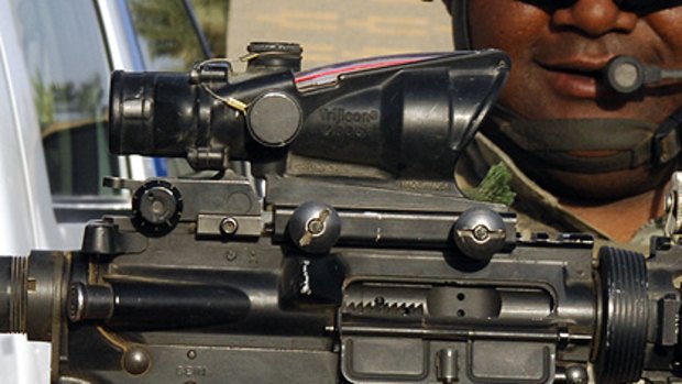Focus on religion ... a telescopic sight on a US M-4 carbine.
