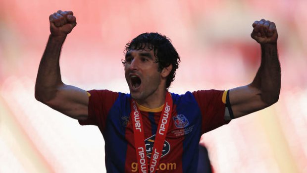 No time to celebrate: Mile Jedinak had barely qualified for the Premier League with Crystal Palace before he was due in Japan for Socceroos duty.