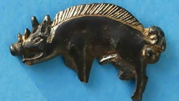 A silver-gilt boar badge thought to have been worn by a knight in Richard III's retinue, and found at the Battle of Bosworth site.