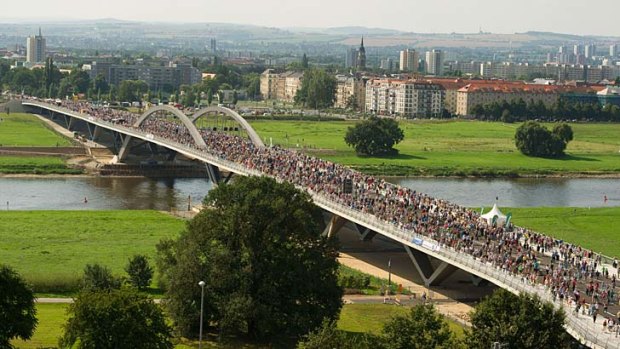 Visitors crowd on the Waldschloesschen bridge spanning over the river Elbe during its inauguration last week in Dresden.