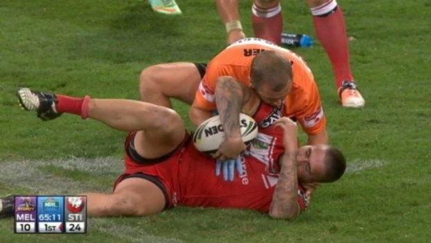 Down for the count: Joel Thompson's injury started a remarkable sequence of events that left the Dragons with just 12 players for the final moments of their loss to Melbourne.