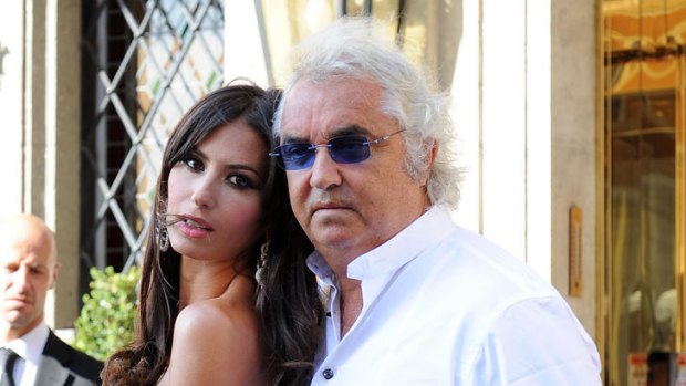 Formula one boss Flavio Briatore and his wife Elisabetta Gregoraci  leave a hotel in  Rome to attend  Petra Ecclestone's wedding.