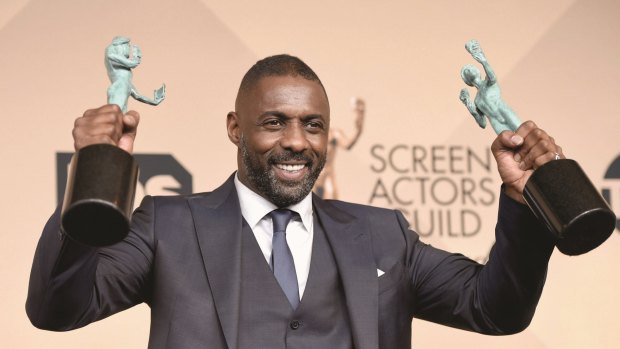 Idris Elba, winner of Outstanding Performance by a Male Actor in a Supporting Role for <i>Beasts of No Nation</i>, and Outstanding Performance by a Male Actor in a Television Movie or Miniseries for <i>Luther</i>.