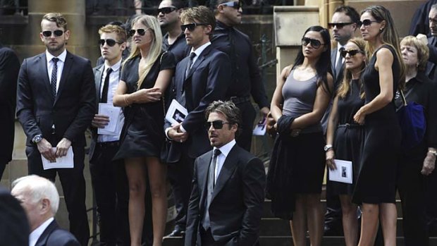 Farewell ... some of the 1000 mourners, including John Ibrahim, on the steps of St Mary's Cathedral and, inset, the order of service. Mr Miller is believed to have died of an accidental overdose.