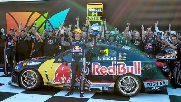 High five: Jamie Whincup celebrates his fifth V8 Supercars title.