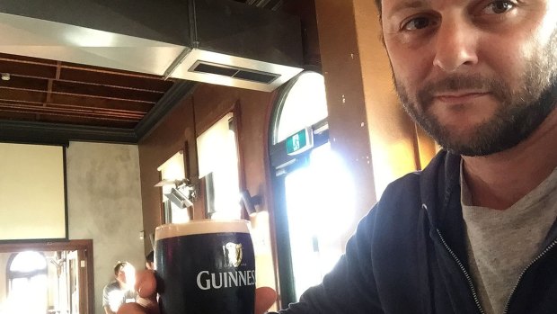 Prestipino enjoying a Guinness at The Windsor - the only beer it serves in a pint glass.