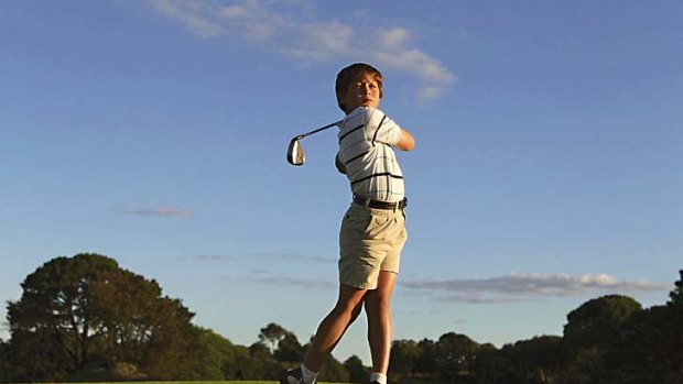 Coming out swinging: Nine-year-old golf champion Karl Vilips.
