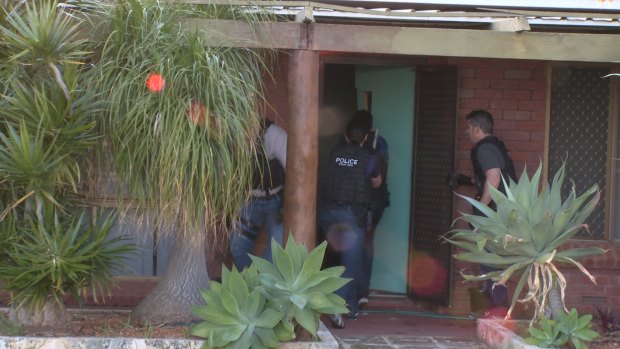 Police raid one of 26 properties searched over two days. 