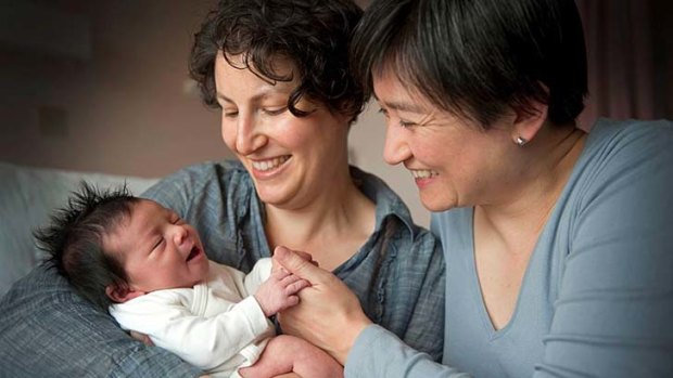 'Our children are loved and our children are cherished'... Senator Penny Wong, with daughter Alexandra and partner Sophie Allouache in 2011.