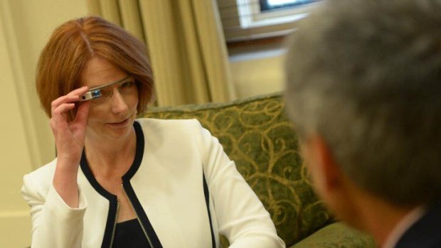 Prime Minister Julia Gillard tries out Google Glass while Google's CFO is in town.