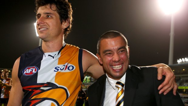 PERTH, AUSTRALIA - AUGUST 31: Andrew Embley of the Eagles embraces Daniel Kerr after playing his last game for the club during the round 23 AFL match between the West Coast Eagles and the Adelaide Crows at Patersons Stadium on August 31, 2013 in Perth, Australia.  (Photo by Paul Kane/Getty Images)