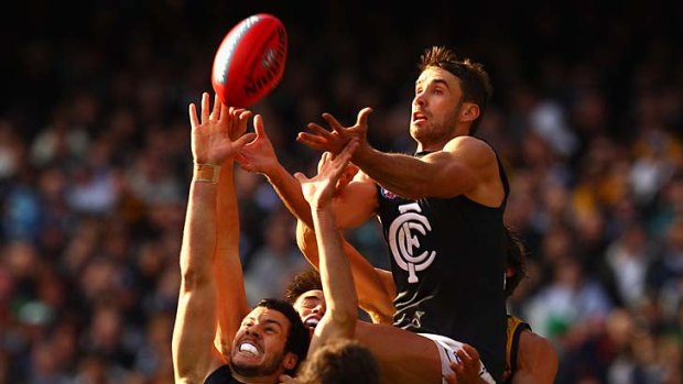 Flying high: Andrew Walker is head and shoulders above the pack yesterday.