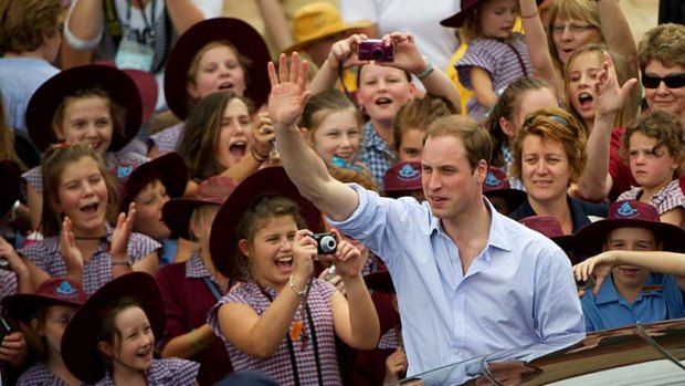 Charming ... Prince William was a hit with the  flood-weary residents of Kerang in northern Victoria yesterday at the tail-end of his visit.