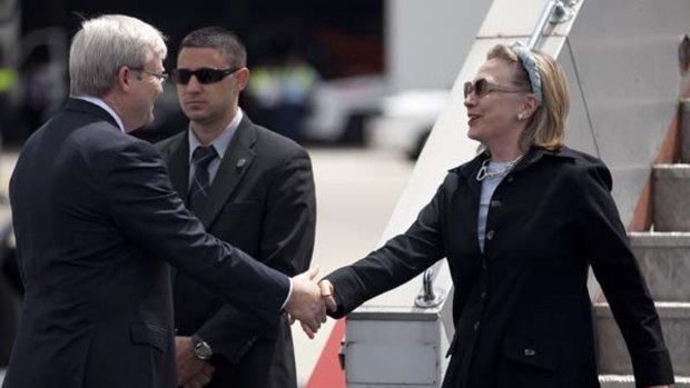 Hillary Clinton is greeted by Kevin Rudd after arriving in Melbourne.