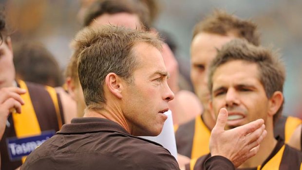 Hawthorn coach Alastair Clarkson lectures the troops at quarter-time.