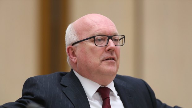 George Brandis said the law reform commission's terms of reference would be subject to consultation with Indigenous communities.