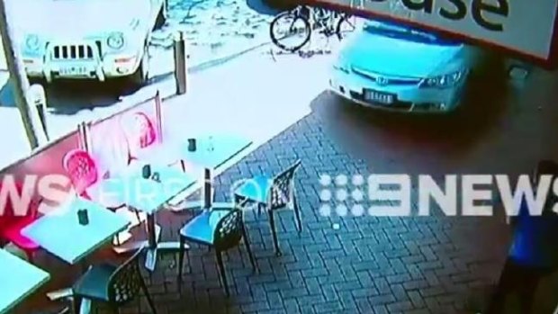 Shocking CCTV footage has captured the moment an elderly driver lost control of his car, ploughed down a busy shopping strip, and crashed into a building in Melbourne's south-east. 