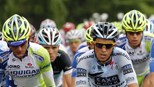 Defending champion Alberto Contador finished 47th in Wednesday's stage as he prepares for the mountains.