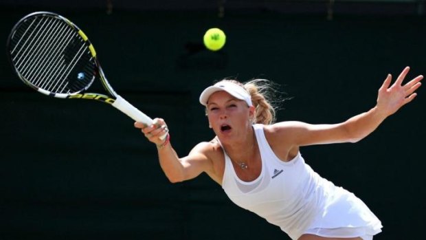 Denmark's Caroline Wozniacki returns to Croatia's Ama Konjuh.