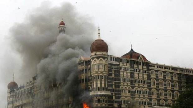 The Taj Mahal hotel is engulfed in smoke during a terrorist attack in Mumbai November 29, 2008. Now it is believed Pakistani spies may have been involved.