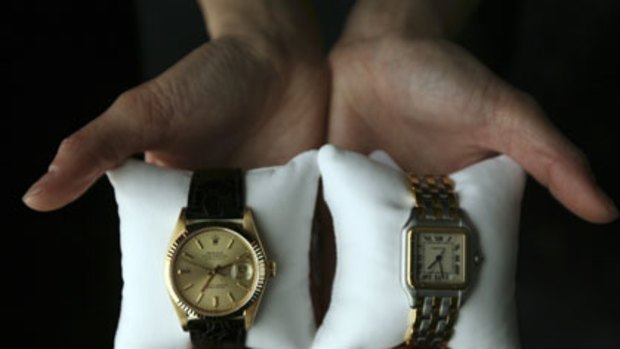 Watches ... a mens Rolex worth $7000 and a ladies Cartier worth $2800.