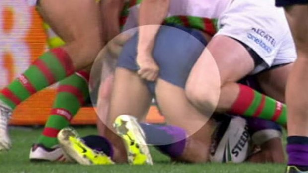 Touchy subject: Sam Burgess had a firm grip on Will Chambers.