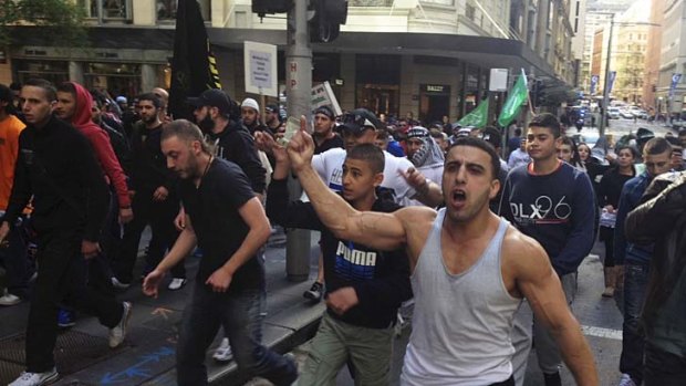 "These youth are basically protesting against the broader context of Islamophobia" ... Muslim protesters march through Sydney's CBD.