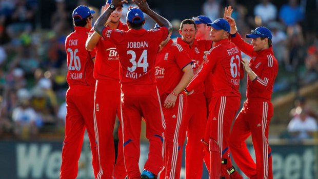 England players celebrate the wicket of Aaron Finch.