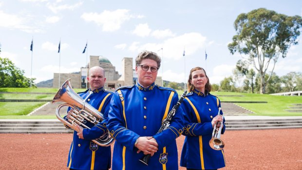 Canberra City Band members Stephen Blake, president Stephen Hallyburton, and vice president Liz Charlton. 