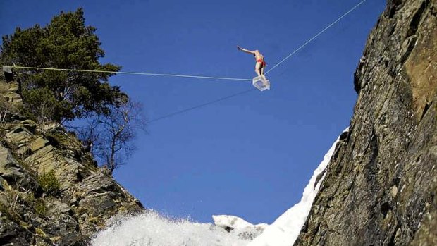 Norwegian performer Eskil Ronningsbakken demontrates his balance at lethal heights.