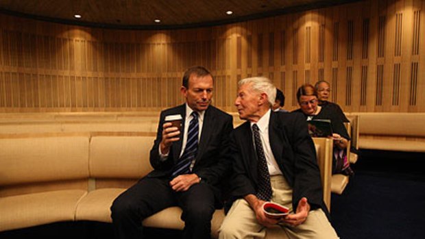 Relative support ... Tony Abbott with his father, Richard, at the forum on pension ages at the Sydney Masonic Centre.