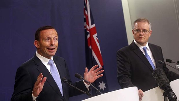 "It can be done": Tony Abbott with Immigration Minister Scott Morrison.