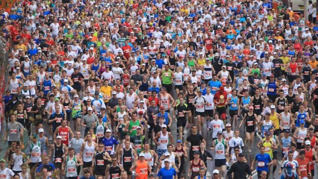 Mass attraction ... running in the rain at the City2Surf.