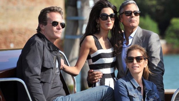 George Clooney with his fiancee Amal Alamuddin, Cindy Crawford and her husband Rande Gerber.