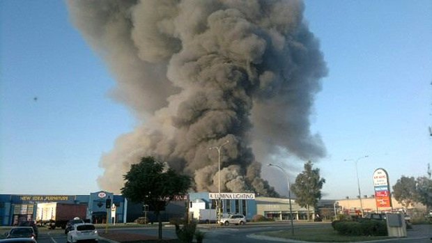 The fire is threatening to take over neighbouring buildings. Photo: 6PR via Twitter